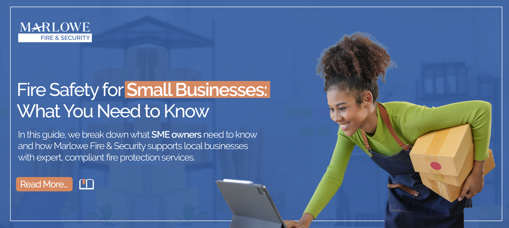 Small business owner managing online orders in a shop, representing fire safety responsibilities for small businesses